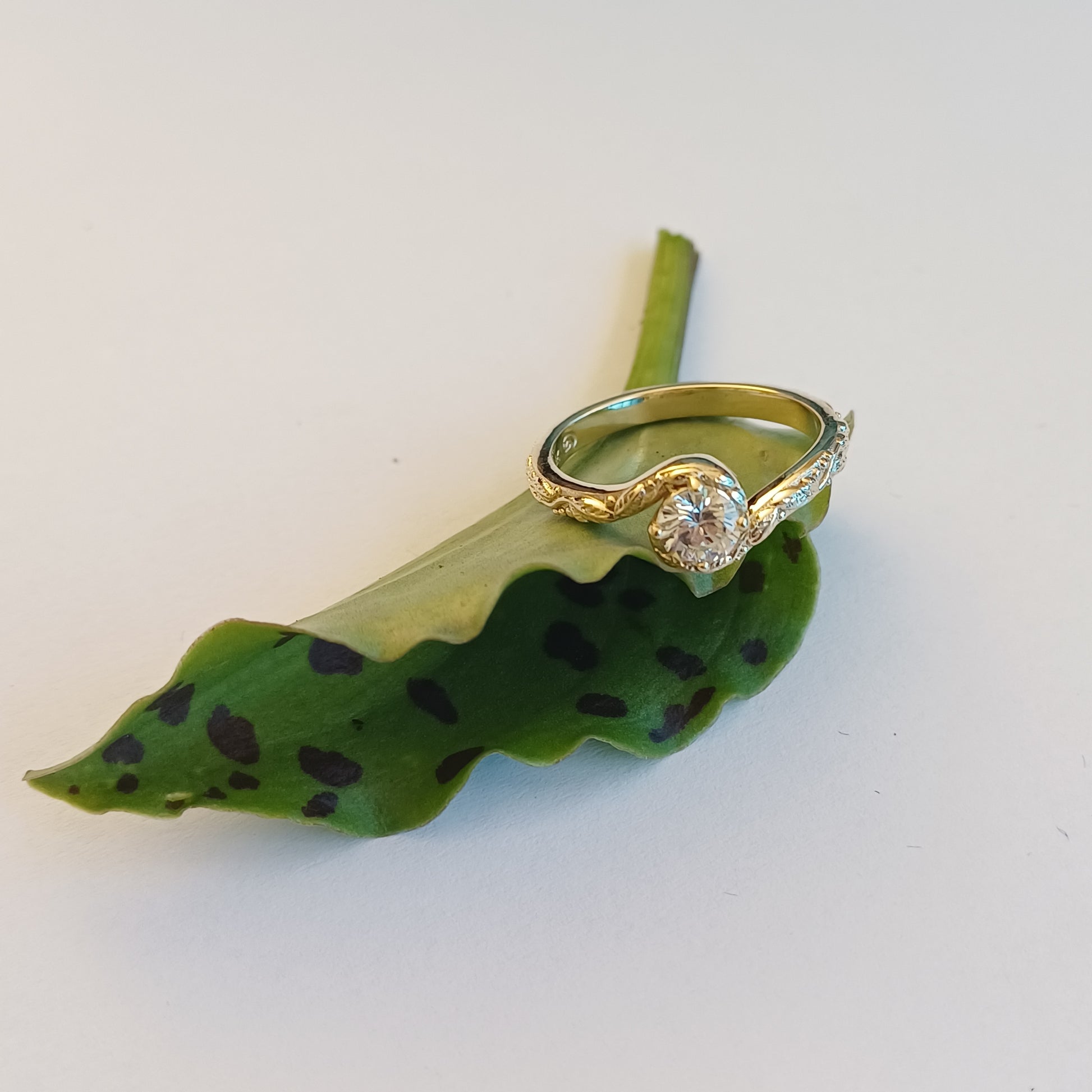 Solitaire Leaf Ring with Curved Band